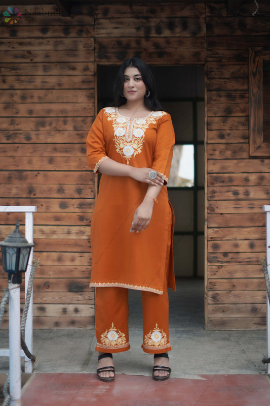 Winter Wear Rust Orange Long Kashmiri Kurti Co-Ord Set With Multi Colored Embroidery